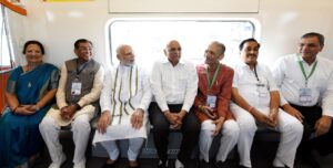 PM takes a ride in Vande Bharat Express at Gandhinagar Station