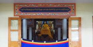 The room in which the Dalai Lama teaches (the chair is covered in saffron cloth)Photo by Christopher Heise.