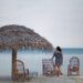 A girl standing by a beach at Lakshadweep Island