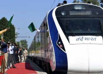 PM Narendra Modi flagging off the inaugural run of the new Vande Bharat Express from Amb Andaura, Una to New Delhi, in Una, Himachal Pradesh on October 13, 2022.