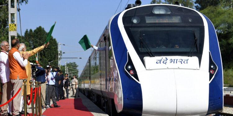PM Narendra Modi flagging off the inaugural run of the new Vande Bharat Express from Amb Andaura, Una to New Delhi, in Una, Himachal Pradesh on October 13, 2022.