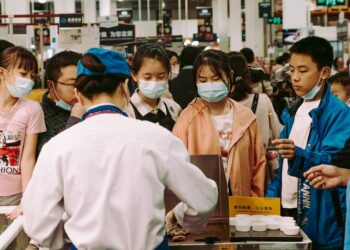 Spike In Covid Infections; China Tightens Travel Curbs
